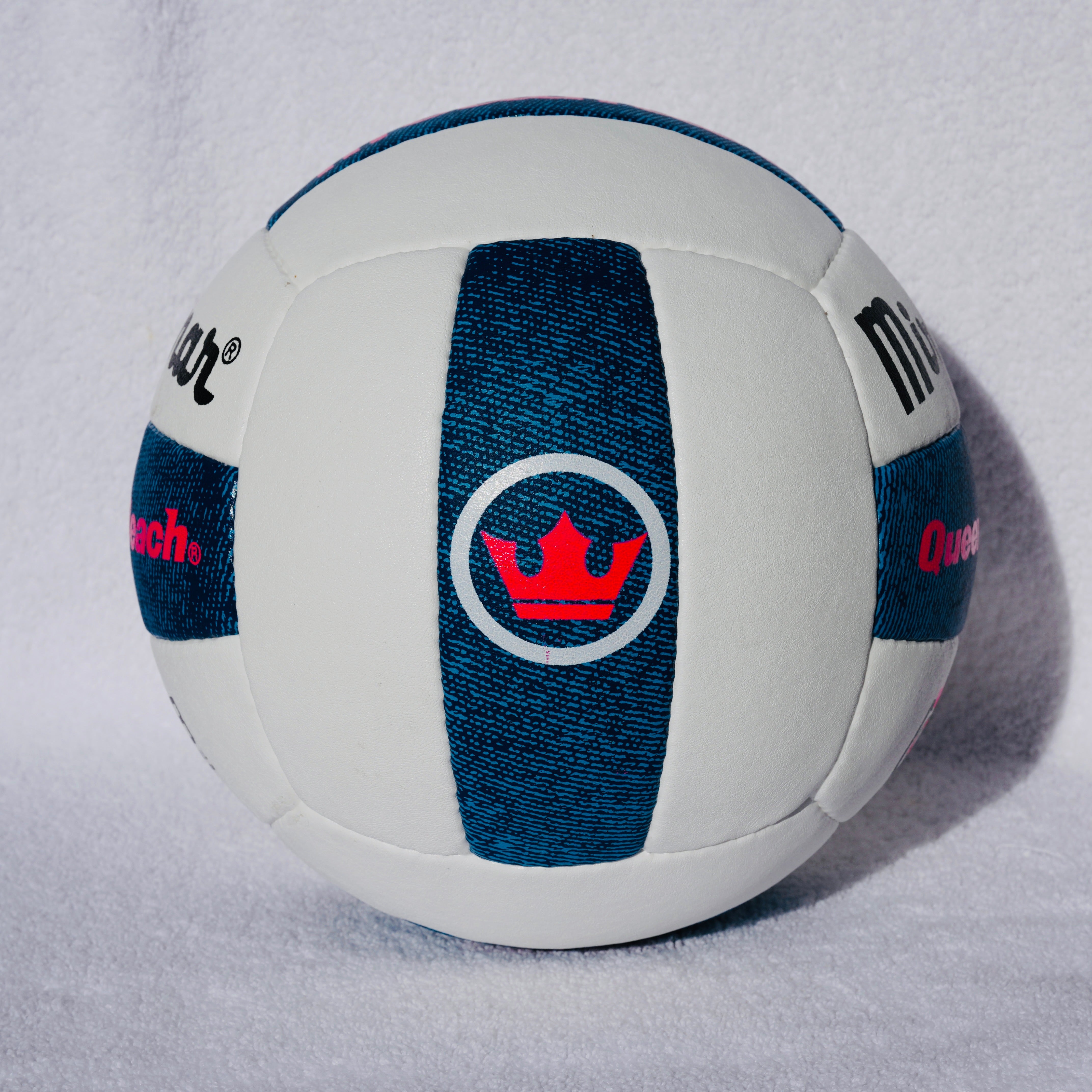 White and blue volleyball with a red and blue logo on a white background